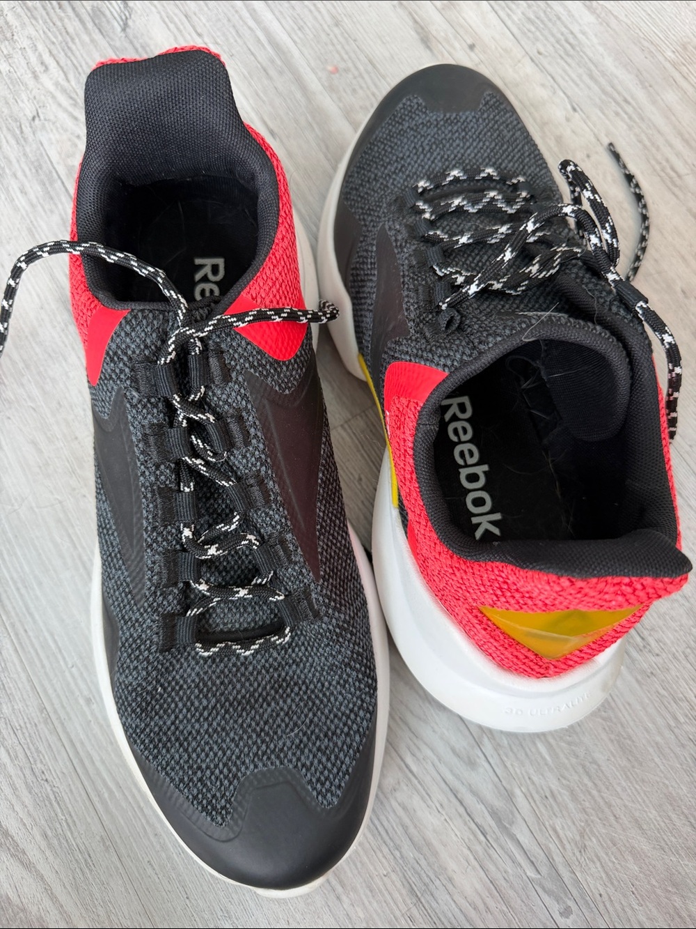 Reebok Men's Black & Red Athletic Sneakers with Yellow Accent